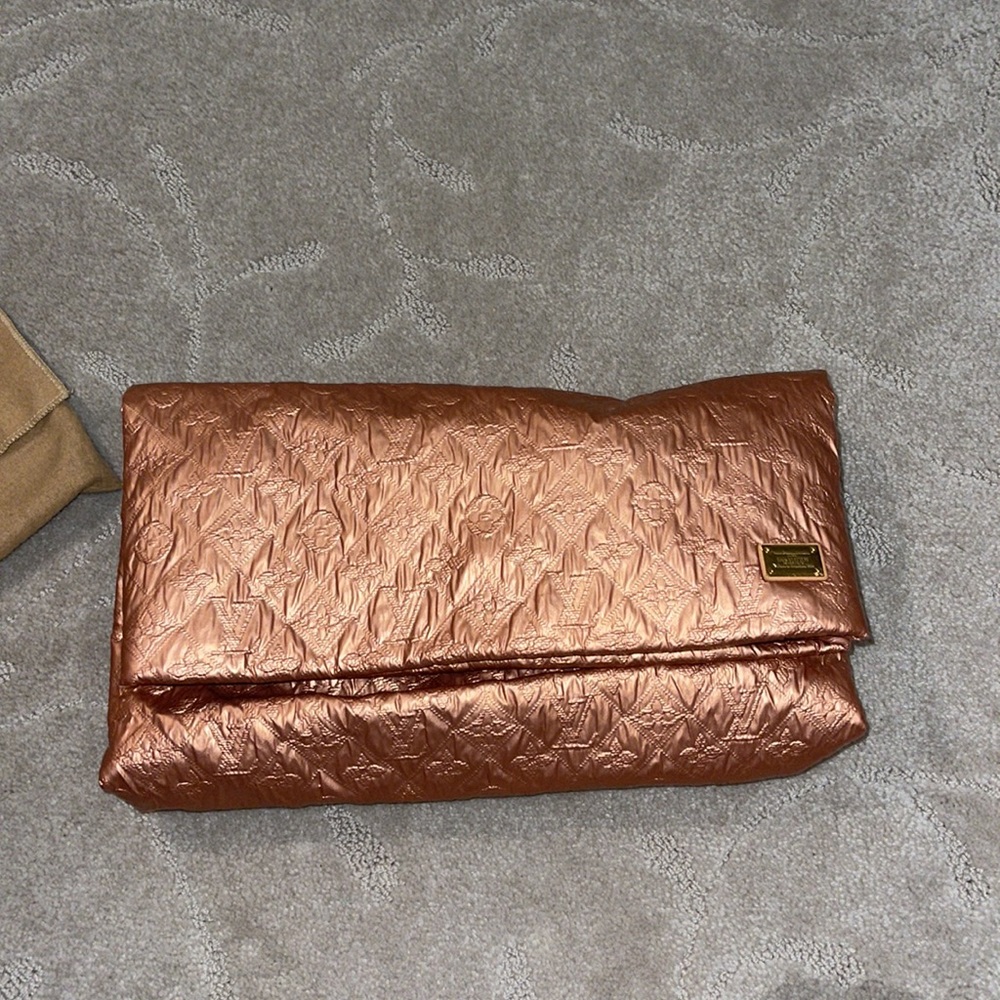 Authentic Louis Vuitton Limelight clutch